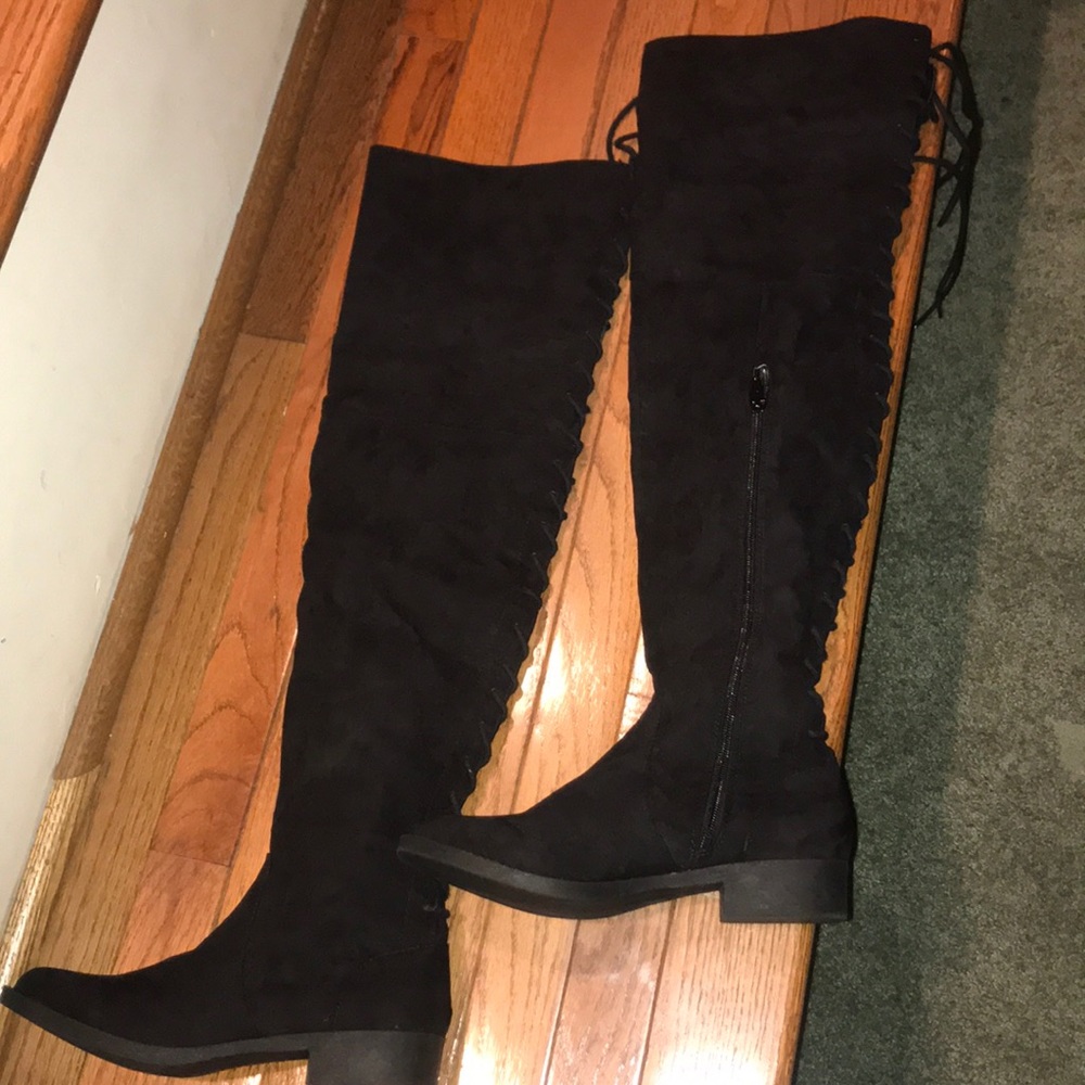 Black suede over the knee. Lace up boots